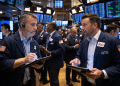 Dow Jones slips, S&P gains as oil surges and market volatility spikes