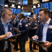 Dow Jones slips, S&P gains as oil surges and market volatility spikes