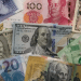 Forex markets turn cautious as oil surges on Middle East risks