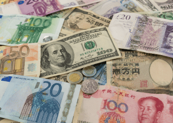 Global currencies trade in narrow ranges as markets focus on inflation and oil